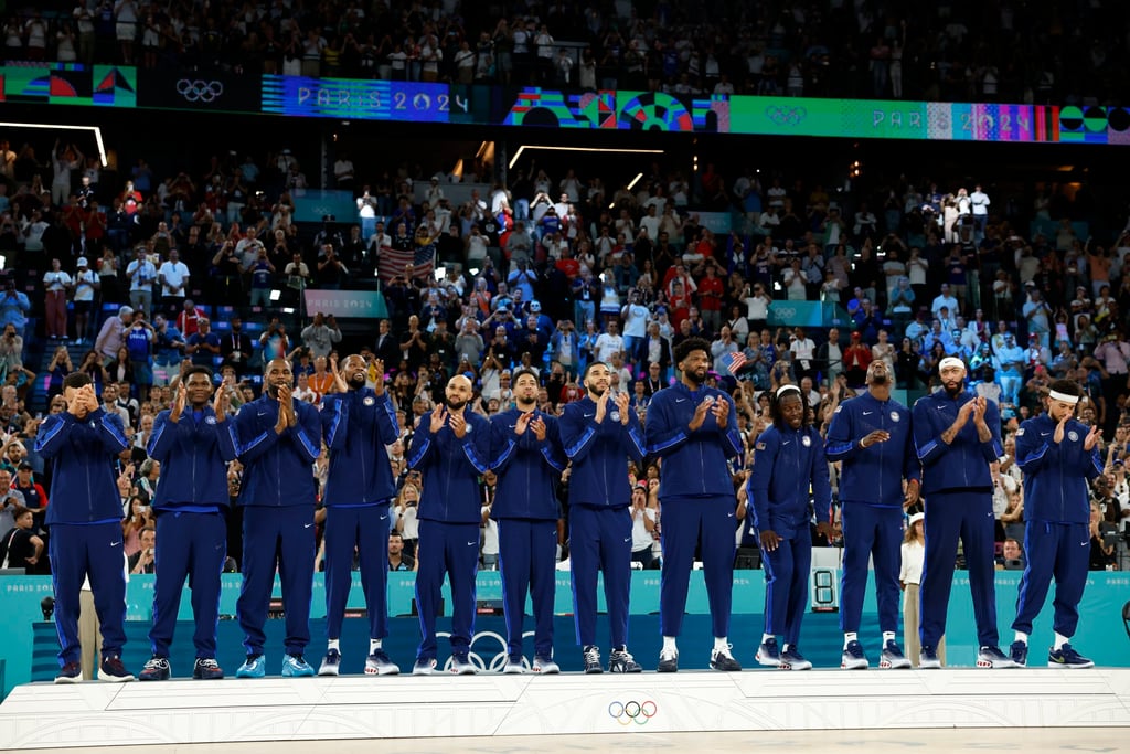 USA players line up on the podium with their gold medals around their necks as their dominance continues. Photo: EPA USA players line up on the podium with their gold medals around their necks as their dominance continues. Photo: EPA