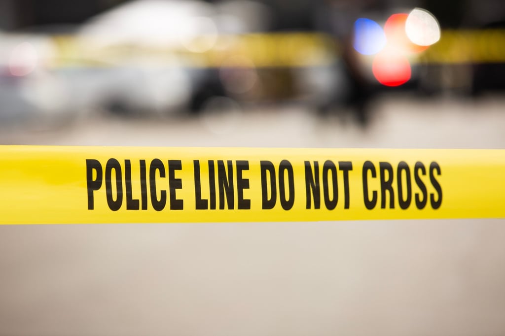 Cordon tape seals off a crime scene and establishes a police line for further investigations in California, USA. Phot: Shutterstock Cordon tape seals off a crime scene and establishes a police line for further investigations in California, USA. Phot: Shutterstock