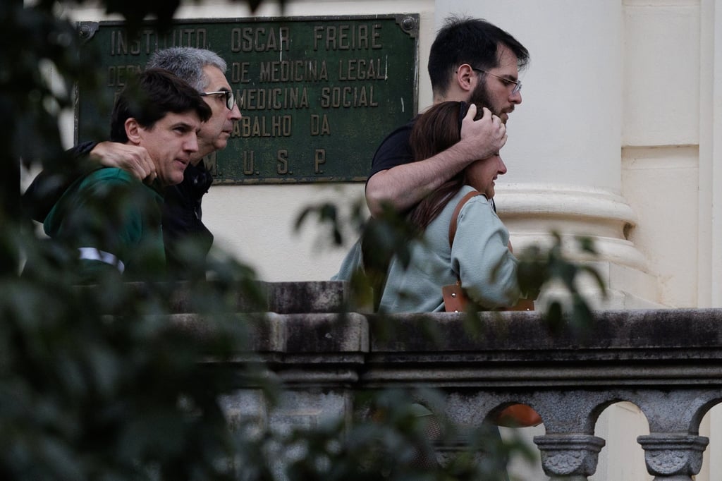 Relatives of victims of the Voepass flight 2283 accident arrive at the Oscar Freire Institute in Sao Paulo, where the process of identifying the bodies is to take place.