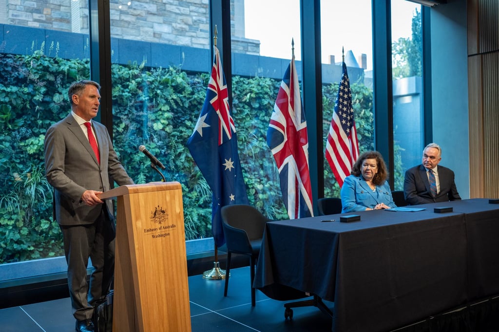Australia’s Deputy Prime Minister and Minister for Defence Richard Marles, British Ambassador to the USA Karen Pierce and US Deputy Secretary of State Kurt Campbell sign the Aukus agreement for cooperation related to naval nuclear propulsion in Washington DC, on August 5. Photo: Australia’s government