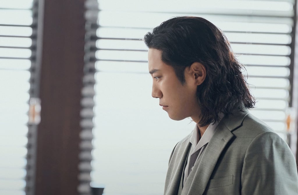 Jin Goo as the JU Construction CEO’s brother Dae-woong in a still from The Auditors.