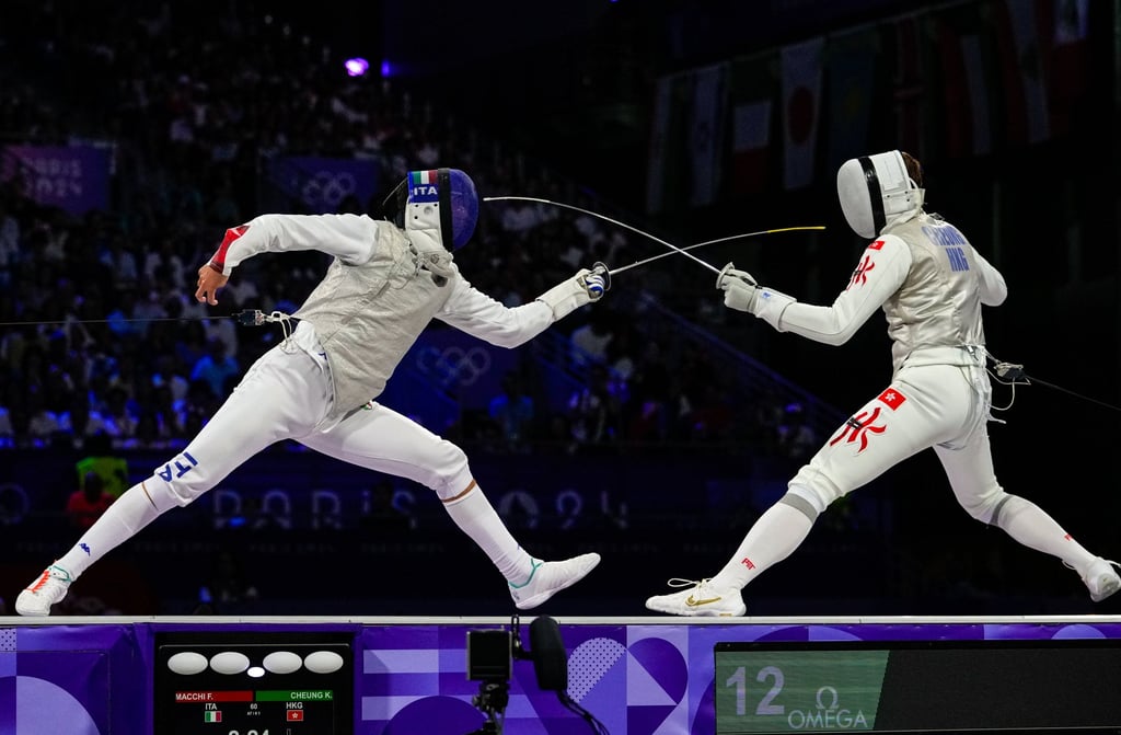 Hong Kong’s Cheung Ka-long (right) competes with Italy’s Filippo Macchi in the men’s individual foil final at the 2024 Olympics, on July 29, 2024. Photo: AP Hong Kong’s Cheung Ka-long (right) competes with Italy’s Filippo Macchi in the men’s individual foil final at the 2024 Olympics, on July 29, 2024. Photo: AP