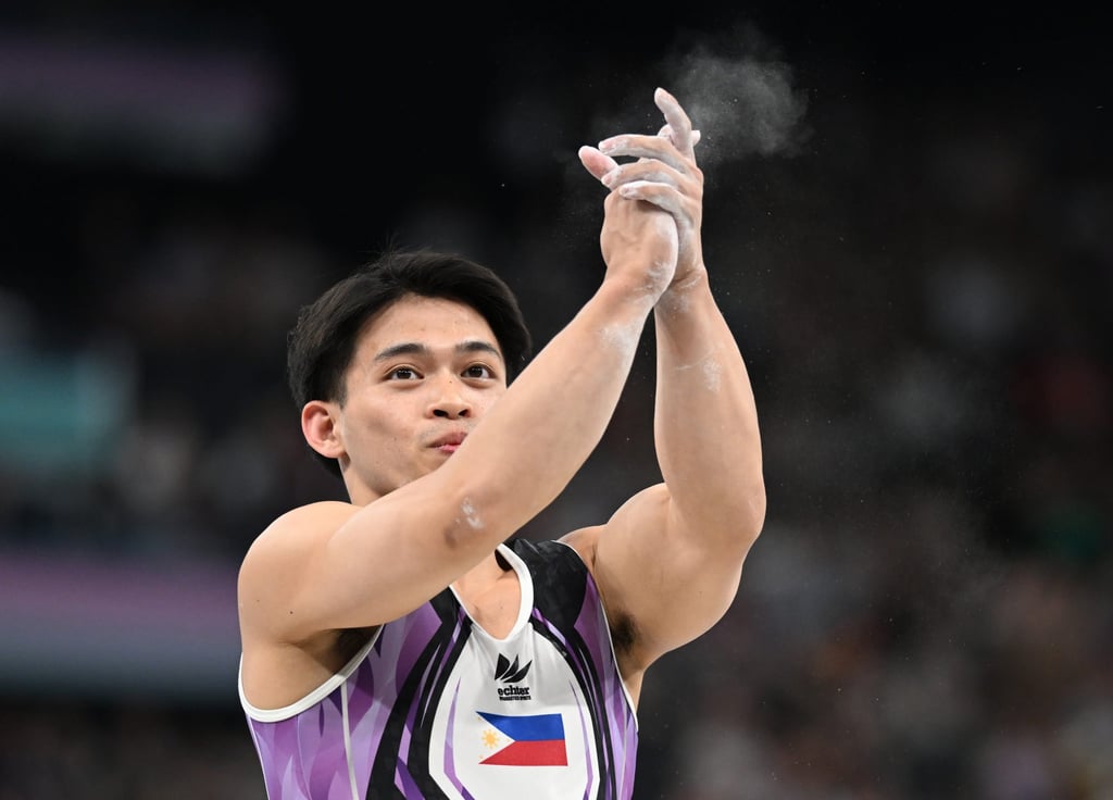 Gymnast Carlos Yulo is the first Filipino to win two Olympic titles, and did so in a single Games. Photo: Xinhua