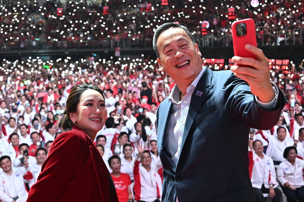 Pheu Thai’s prime ministerial candidates Paetongtarn Shinawatra and Srettha Thavisin at the party’s final campaign event in Bangkok on May 12, 2023. Photo: AFP