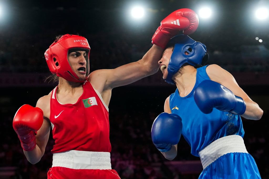 Algeria’s Imane Khelif (left) beat China’s Yang Liu in a unanimous decision in the 66kg boxing final. Photo: AP Algeria’s Imane Khelif (left) beat China’s Yang Liu in a unanimous decision in the 66kg boxing final. Photo: AP