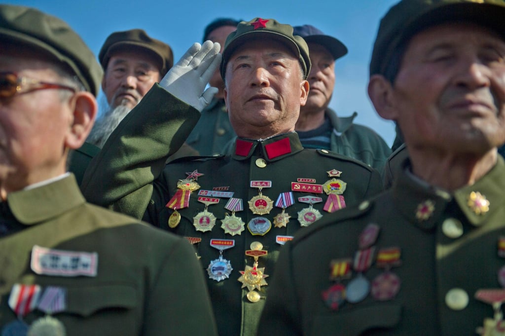 Korean war veterans attend a memorial ceremony in 2016. There are 57 million military veterans in China. Photo: AFP