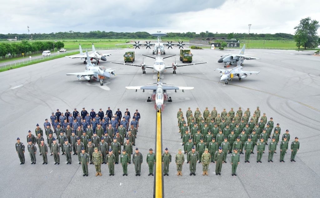 Chinese and Thai troops pose with military aircraft during last year’s Falcon Strike exercises in Thailand in July 2023. Photo: Facebook / RTAF