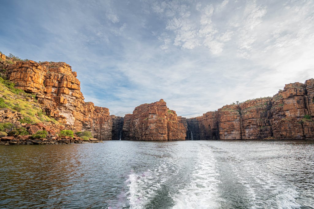 A Zodiac cruise takes guests along King George River, visiting its famous twin waterfalls in the background. Photo: Seabourn