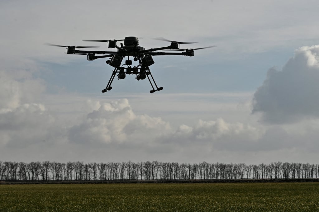 A Ukrainian Vampire drone with attached mortar shells is seen in the air near the front line in the Zaporizhzhia region in February. Photo: Reuters