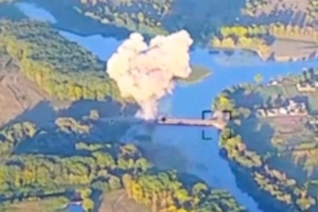 Smoke rises in what is said to show the destruction of a key bridge in Russia’s Kursk region. Photo: Ukrainian Armed Force via AP Smoke rises in what is said to show the destruction of a key bridge in Russia’s Kursk region. Photo: Ukrainian Armed Force via AP