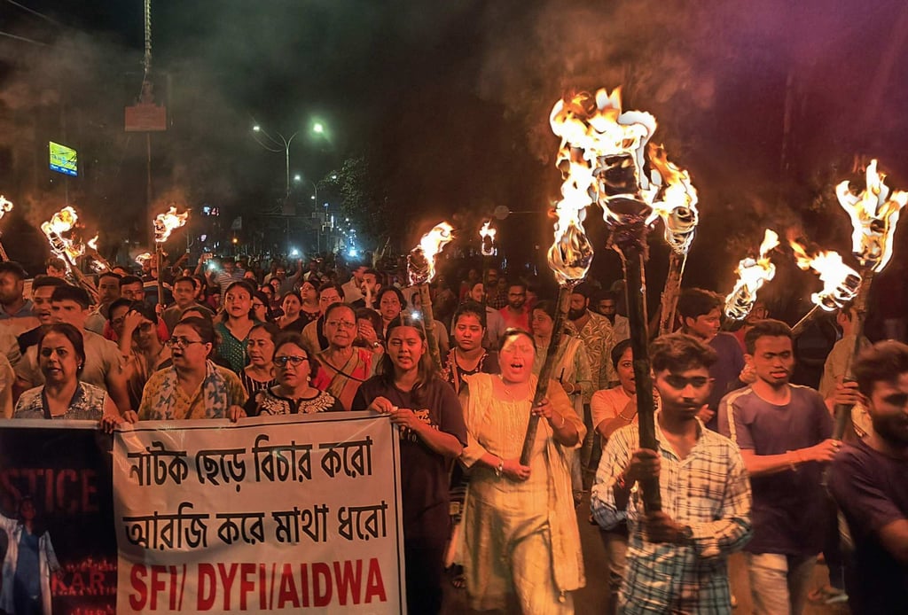 Medical professionals, activists and citizens chant as they take part in a “Reclaim the Night” protest in Siliguri, West Bengal, on Wednesday last week. Photo: AFP