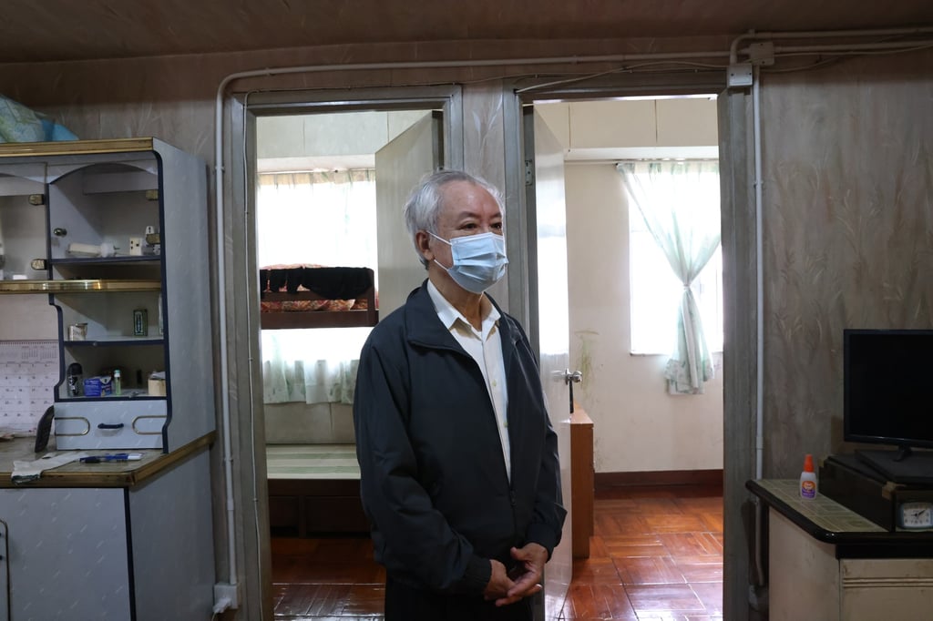 Joseph Ng Goon-lau, who buys and sells dozens of properties linked to unnatural deaths, in one of his flats in Mong Kok. Photo: K. Y. Cheng