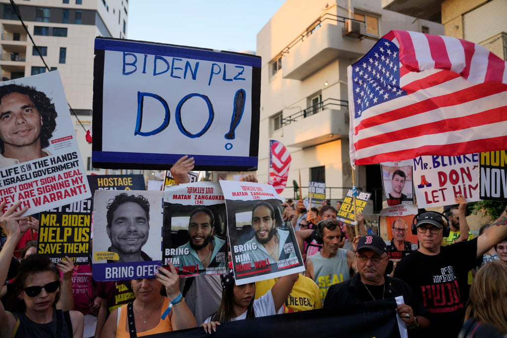 Relatives of hostages held by Hamas in Gaza and their supporters protest in Tel Aviv on Monday. Photo: AP