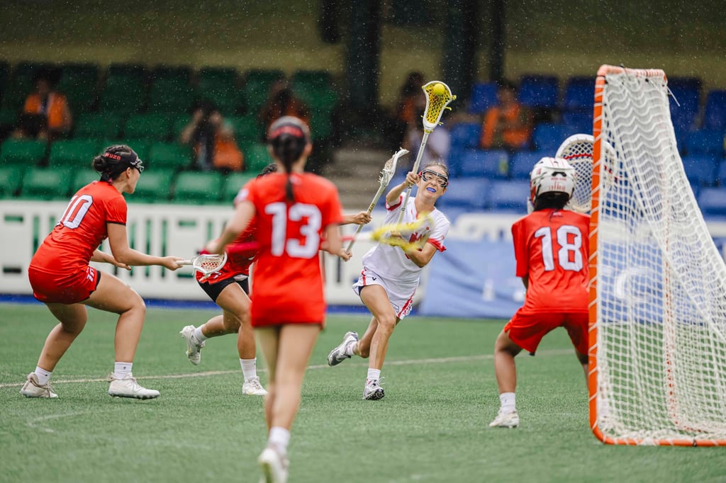 Megan Kitagawa (in white) in action against Hong Kong in the group stage. Photo: HKCLA Megan Kitagawa (in white) in action against Hong Kong in the group stage. Photo: HKCLA
