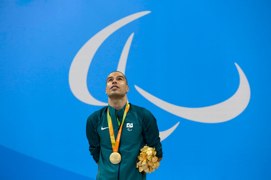 Daniel Dias with his gold medal from the 200-metre freestyle S5 final at the Rio 2016 Paralympic Games. Photo: AP Daniel Dias with his gold medal from the 200-metre freestyle S5 final at the Rio 2016 Paralympic Games. Photo: AP
