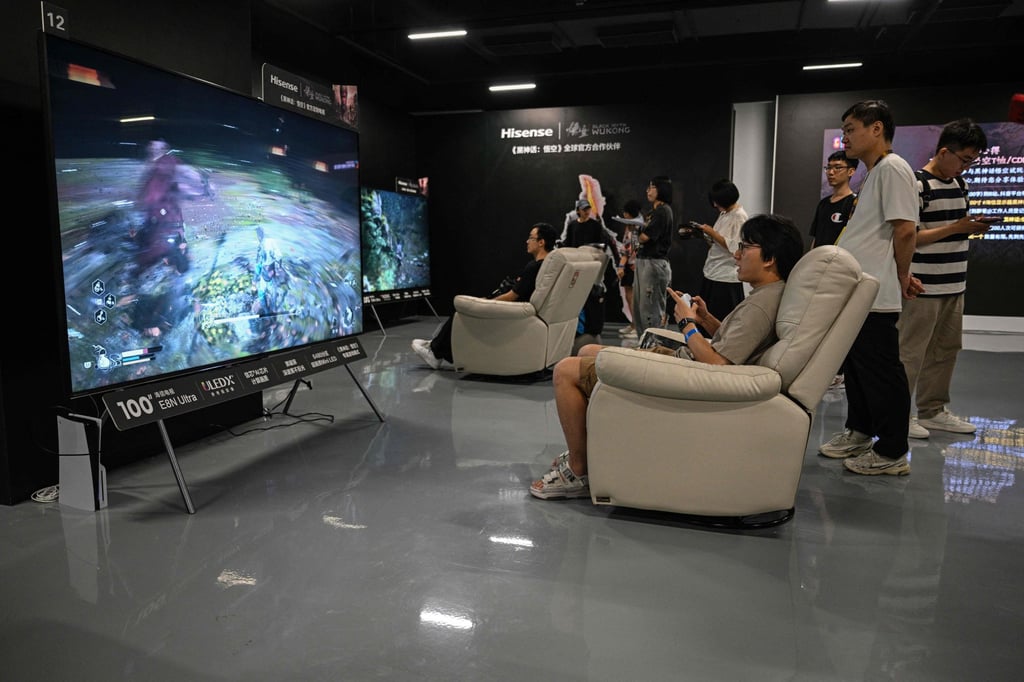 A man plays “Black Myth: Wukong” during its launch day in Shanghai. Gamers were also warned against any reference to “Covid-19”, “isolation” or “quarantine”. Photo: AFP