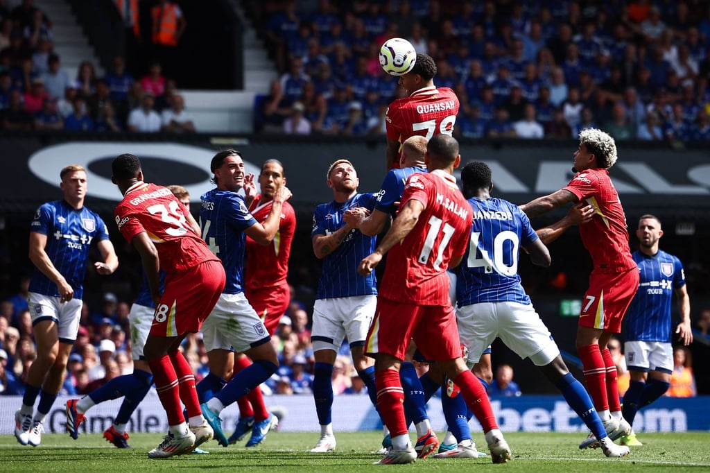 Jarell Quansah (centre) heads the ball during his side’s game against Ipswich Town at Portman Road. Photo: AFP