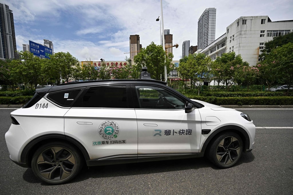 A robotaxi, developed as part of Baidu’s Apollo Go autonomous driving project, seen on the road in Wuhan, capital of central Hubei province. Photo: AFP