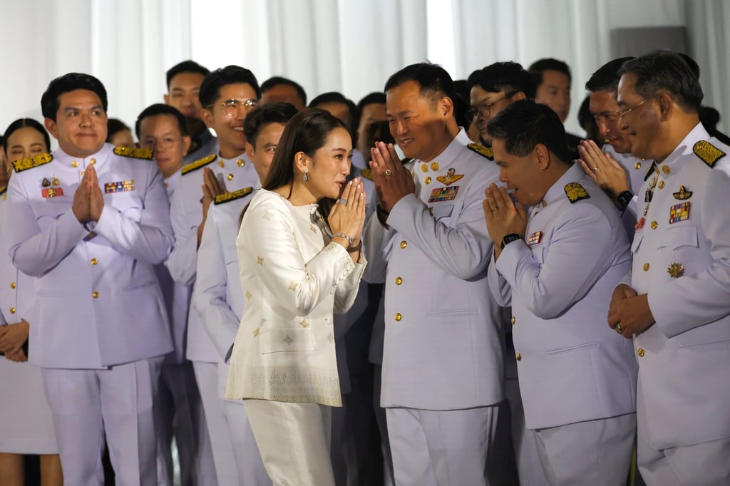 Thailand’s new Prime Minister Paetongtarn Shinawatra (centre) greets other party leaders in Bangkok on August 18. Photo: EPA-EFE