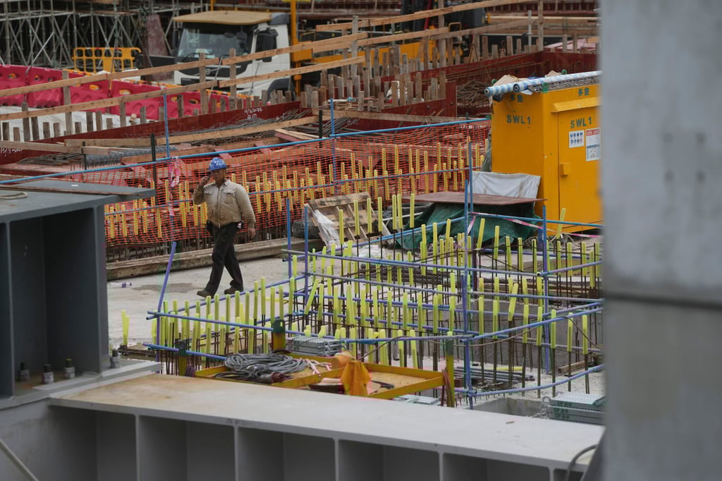 A construction worker on a building site in Central, August 16, 2024. Photo: Sam Tsang