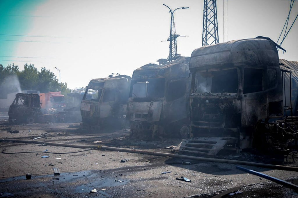 Burnt-out trucks at the site of a missile attack at an undisclosed location in Odesa region of Ukraine. Photo: Ukrainian Emergency Service/AFP