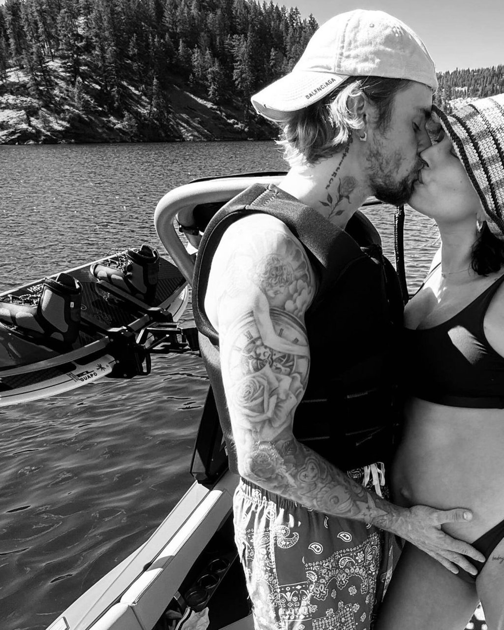 Justin Bieber and Hailey Bieber sharing a kiss in June 2024. Photo: @justinbieber/Instagram