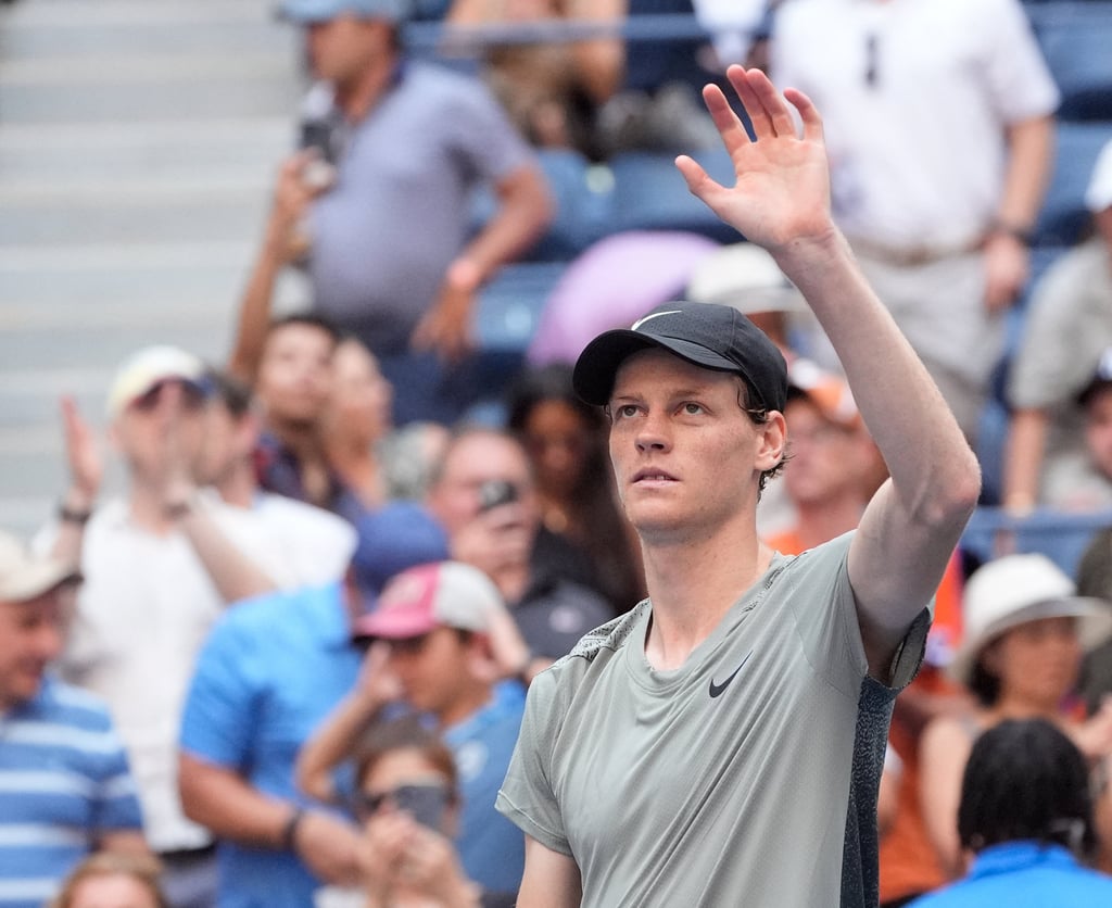 Jannik Sinner waves to the crowd at Flushing Meadows after his first-round victory. Photo: USA TODAY Sports