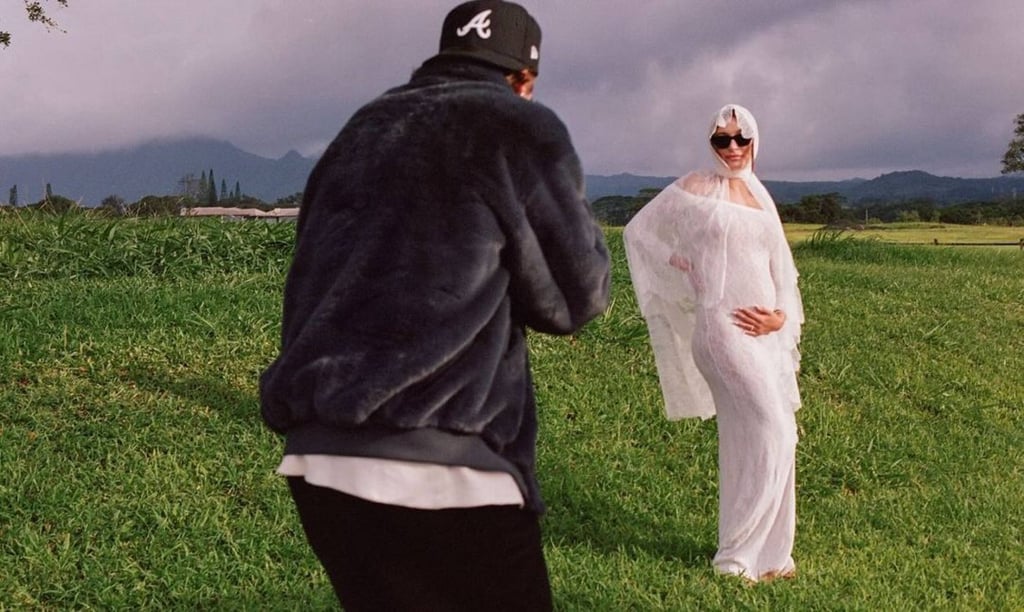 Justin Bieber with Hailey Bieber in custom YSL to announce their pregnancy. Photo: @haileybieber/Instagram