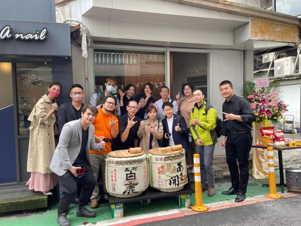 Chiang (front, third from left) outside his sake bar in Taipei. Photo: Facebook / jiangwayne.com Sake Bar Jr. Chiang (front, third from left) outside his sake bar in Taipei. Photo: Facebook / jiangwayne.com Sake Bar Jr.