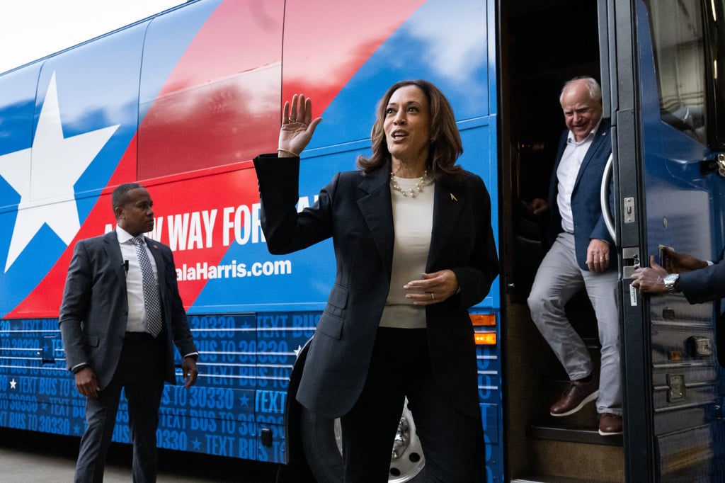 Democratic presidential candidate US Vice-President Kamala Harris and her running mate, Minnesota Governor Tim Walz, leave their campaign bus in Savannah, Georgia, on Wednesday as part of a two-day tour across the state. Photo: AFP/Getty Images/TNS