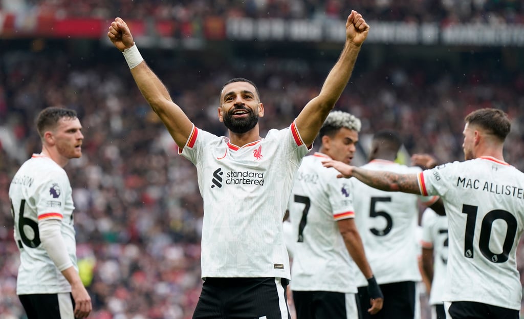 Liverpool’s Mohamed Salah celebrates scoring his side’s third against Manchester United at Old Trafford. Photo: DPA Liverpool’s Mohamed Salah celebrates scoring his side’s third against Manchester United at Old Trafford. Photo: DPA