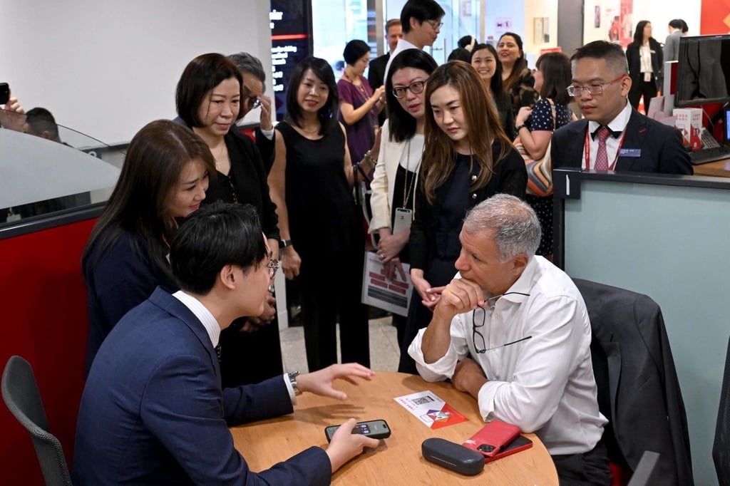 HSBC group CEO Georges Elhedery (seated right) visited branches in Hong Kong to gain a first-hand experience of the bank’s customer service. Photo: Handout HSBC group CEO Georges Elhedery (seated right) visited branches in Hong Kong to gain a first-hand experience of the bank’s customer service. Photo: Handout