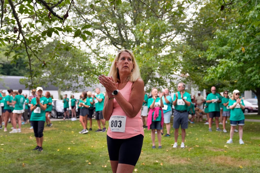 Carolyn Baker, who collapsed from heatstroke at the Falmouth Road Race in 2023, prepares for the 2024 race in Falmouth, Massachusetts. Photo: AP