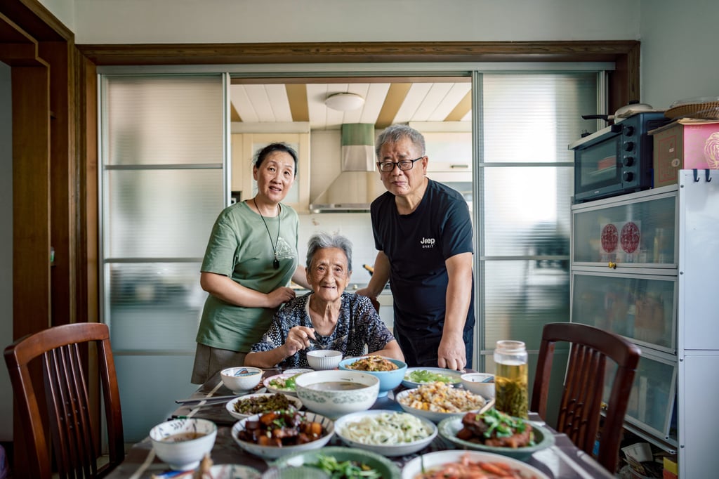 Writer Tracy Wen Liu’s grandmother and parents, Zhu Jindong and Liu Zhongwei. Photo: Graeme Kennedy Writer Tracy Wen Liu’s grandmother and parents, Zhu Jindong and Liu Zhongwei. Photo: Graeme Kennedy