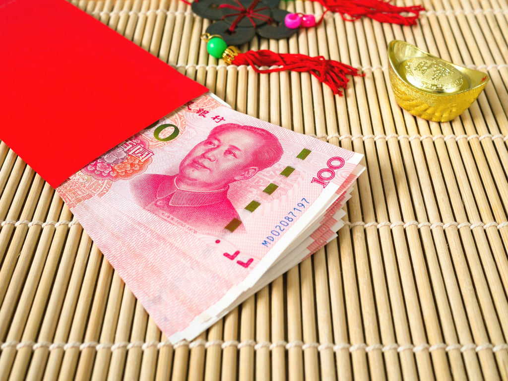 Lai see red packets containing money are given to the bride and groom at Chinese weddings. Photo: Shutterstock