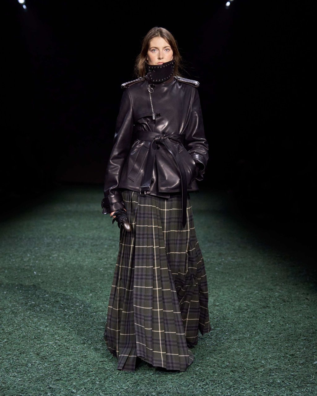 Burberry paired a long, dark tartan skirt with an lather coat at the brand’s winter 2024 show. Photo: Handout