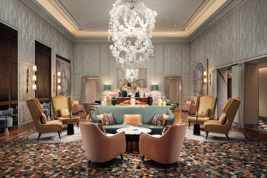 The fresh, modern lobby of The St Regis Venice features a sculptural lamp by Ai Weiwei