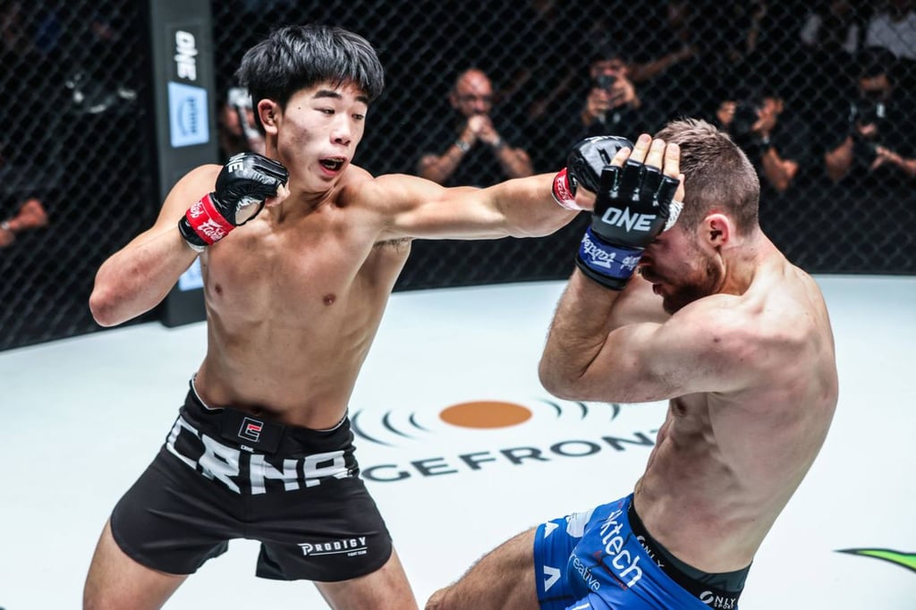 Adrian Lee (left) lands a punch during his victory over Antonio Mammarella at ONE 167 Photo: ONE Championship Adrian Lee (left) lands a punch during his victory over Antonio Mammarella at ONE 167 Photo: ONE Championship
