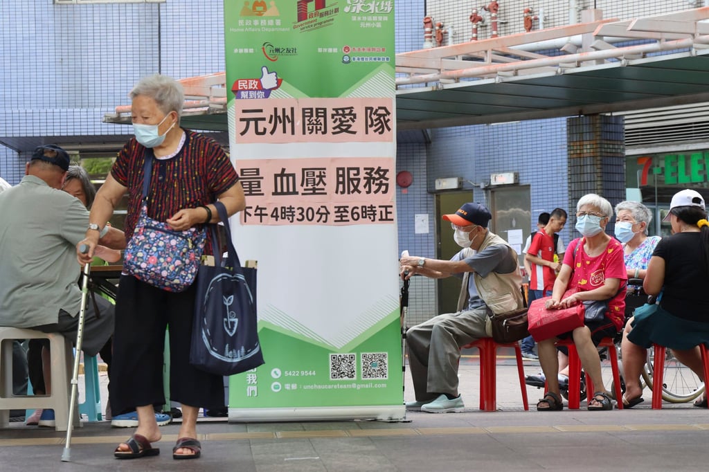 Elderly residents have their blood pressure taken in Un Chau Estate, Cheung Sha Wan, on August 9 as part of a community health initiative. Photo: Jelly Tse