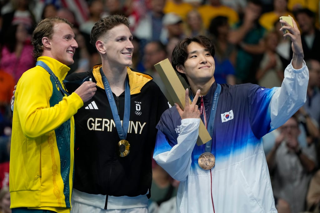 Kim (right) finished behind Germany’s Lukas Maertens and Australia’s Elijah Winnington. Photo: AP