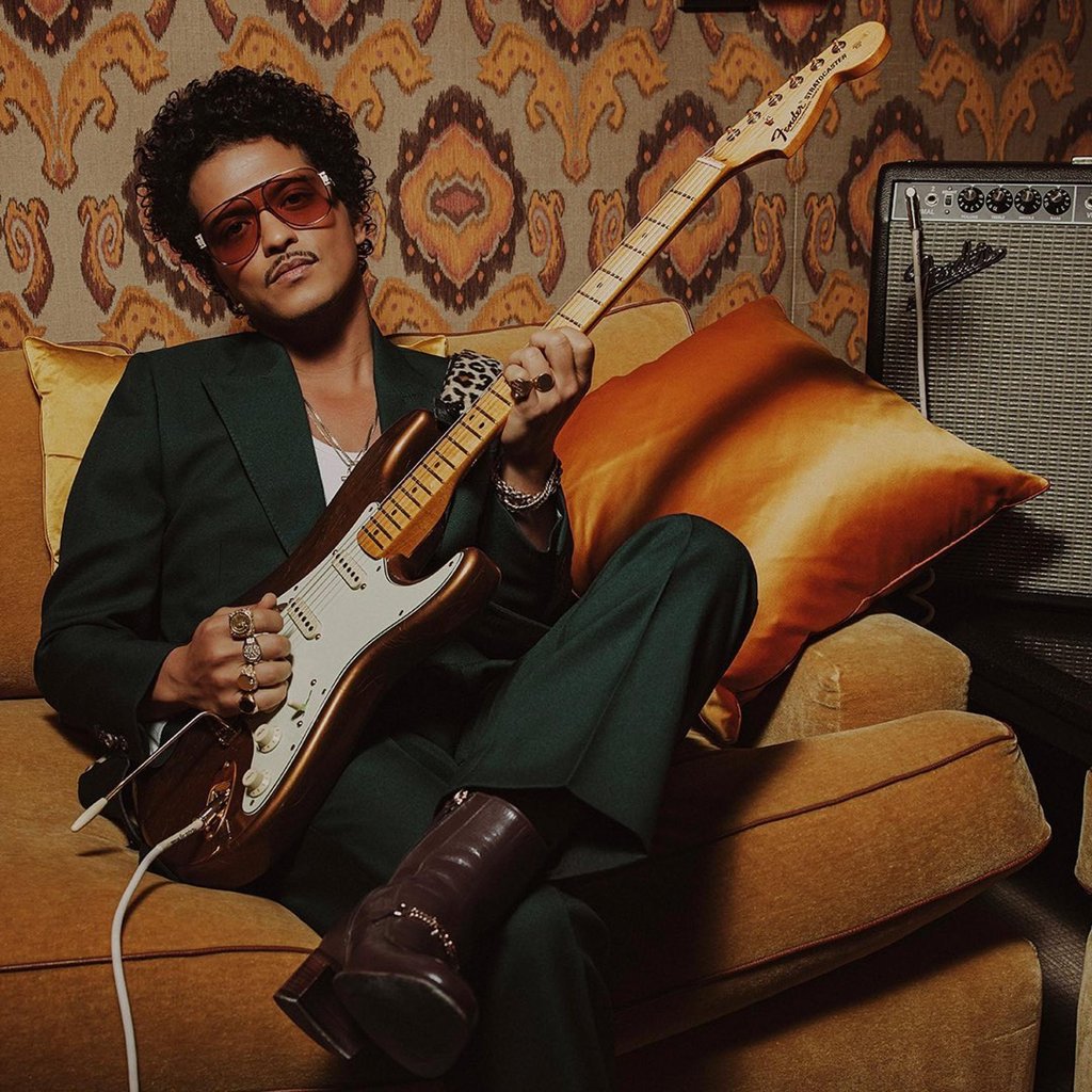 The limited edition Bruno Mars Stratocaster, with the artist who inspired it, in November 2023. Photo: @brunomars/Instagram The limited edition Bruno Mars Stratocaster, with the artist who inspired it, in November 2023. Photo: @brunomars/Instagram