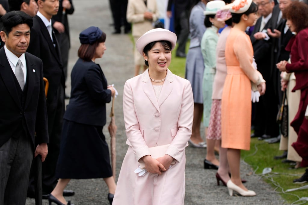 Japan’s Princess Aiko greets guests during the spring garden party at the Akasaka Palace imperial garden in Tokyo in April. Photo: AP