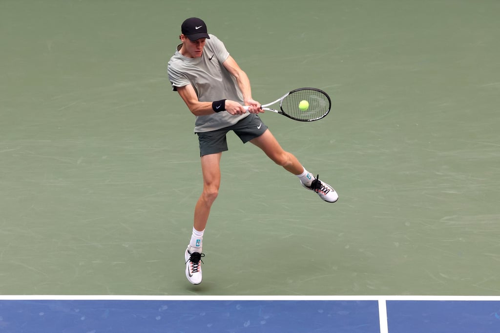 Jannik Sinner hits a return against Taylor Fritz during their men’s singles final at the US Open. Photo: EPA-EFE
