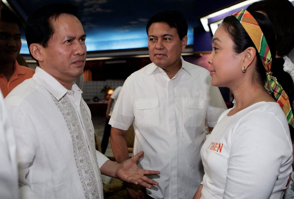 Quiboloy, left, with senator and presidential candidate Manuel Villar, centre, and his vice-presidential candidate Loren Legarda in Davao city, southern Philippines in 2010. Photo: Reuters Quiboloy, left, with senator and presidential candidate Manuel Villar, centre, and his vice-presidential candidate Loren Legarda in Davao city, southern Philippines in 2010. Photo: Reuters