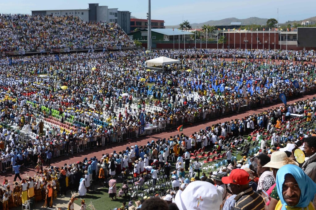 Worshippers gather for a holy mass led by Pope Francis in Port Moresby, Papua New Guinea, on Sunday. Photo: AFP Worshippers gather for a holy mass led by Pope Francis in Port Moresby, Papua New Guinea, on Sunday. Photo: AFP