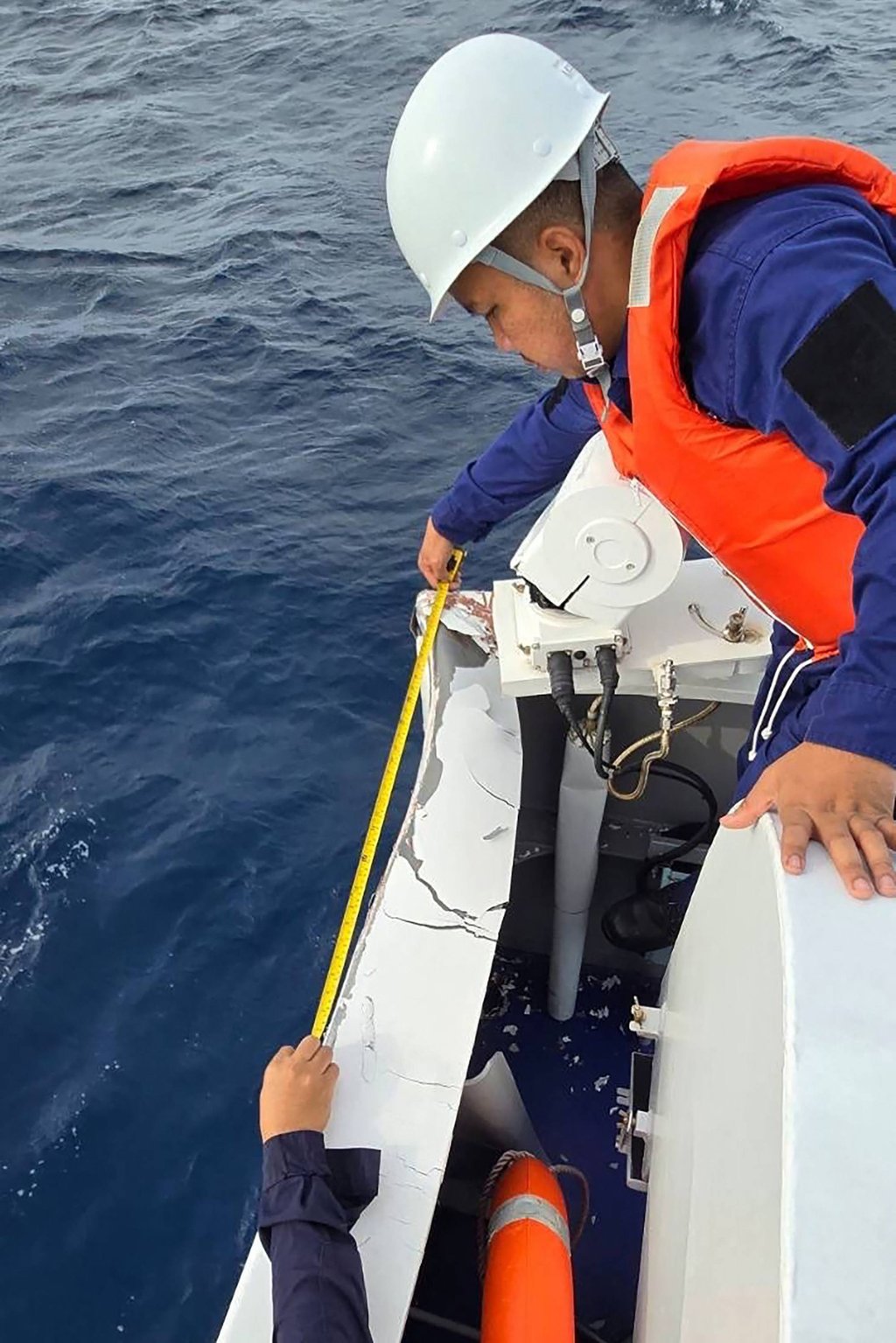 Philippine coastguard personnel inspect damage on the BRP Teresa Magbanua after a collision with a Chinese coastguard ship near Sabina Shoal on August 31. Photo: Philippine Coast Guard/AFP