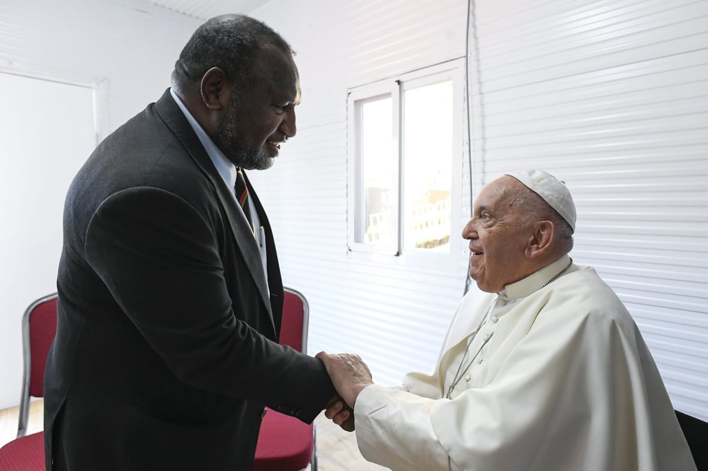 Papua New Guinea Prime Minister James Marape with Pope Francis at the Apostolic Nunciature in Port Moresby on Sunday. Photo: Vatican Media/dpa Papua New Guinea Prime Minister James Marape with Pope Francis at the Apostolic Nunciature in Port Moresby on Sunday. Photo: Vatican Media/dpa