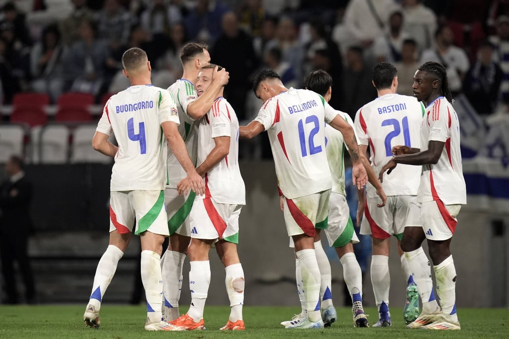 Italy players celebrate after Davide Frattesi scores his side’s first against Israel in Budapest. Photo: DPA Italy players celebrate after Davide Frattesi scores his side’s first against Israel in Budapest. Photo: DPA