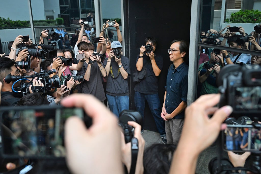 Chung Pui-kuen, the former chief editor of the now-closed Stand News, faces the media having been released on bail after being found guilty in a landmark sedition trial, at Hong Kong’s District Court in Wan Chai on August 29. Photo: AP Chung Pui-kuen, the former chief editor of the now-closed Stand News, faces the media having been released on bail after being found guilty in a landmark sedition trial, at Hong Kong’s District Court in Wan Chai on August 29. Photo: AP