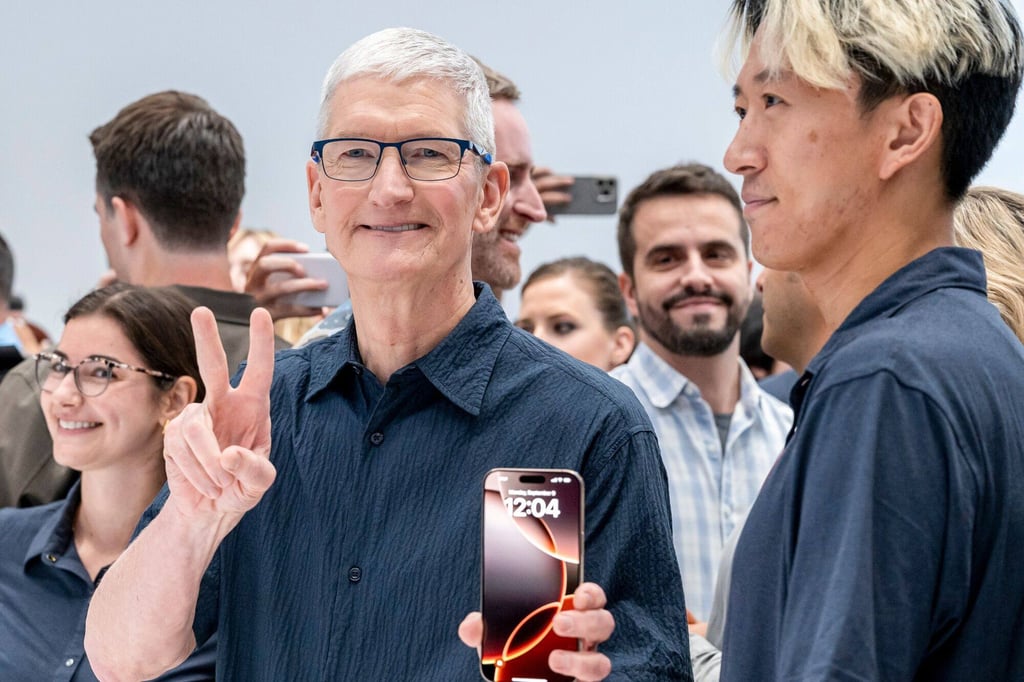 Apple CEO Tim Cook holds the new iPhone 16 Pro Max during an event at the Apple Park campus in Cupertino, California, on Monday. Photo: Bloomberg